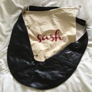 Sash reversible leather purse